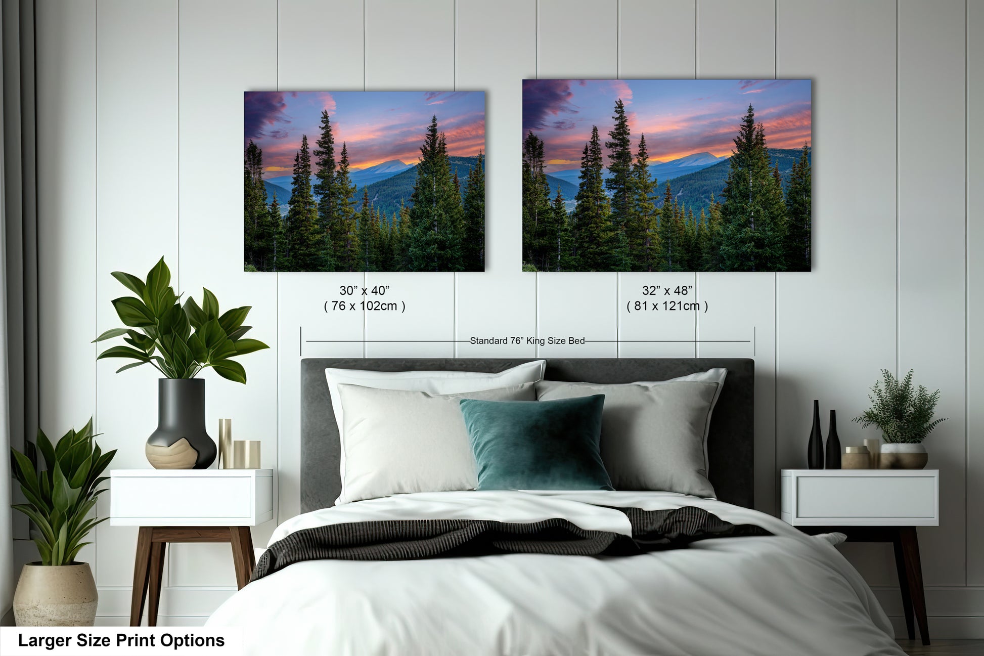 a bedroom with a large bed and two framed landscape photographs hanging on the wall above it. The photographs depict a scenic mountain landscape with pine trees and a colorful sunset sky.
