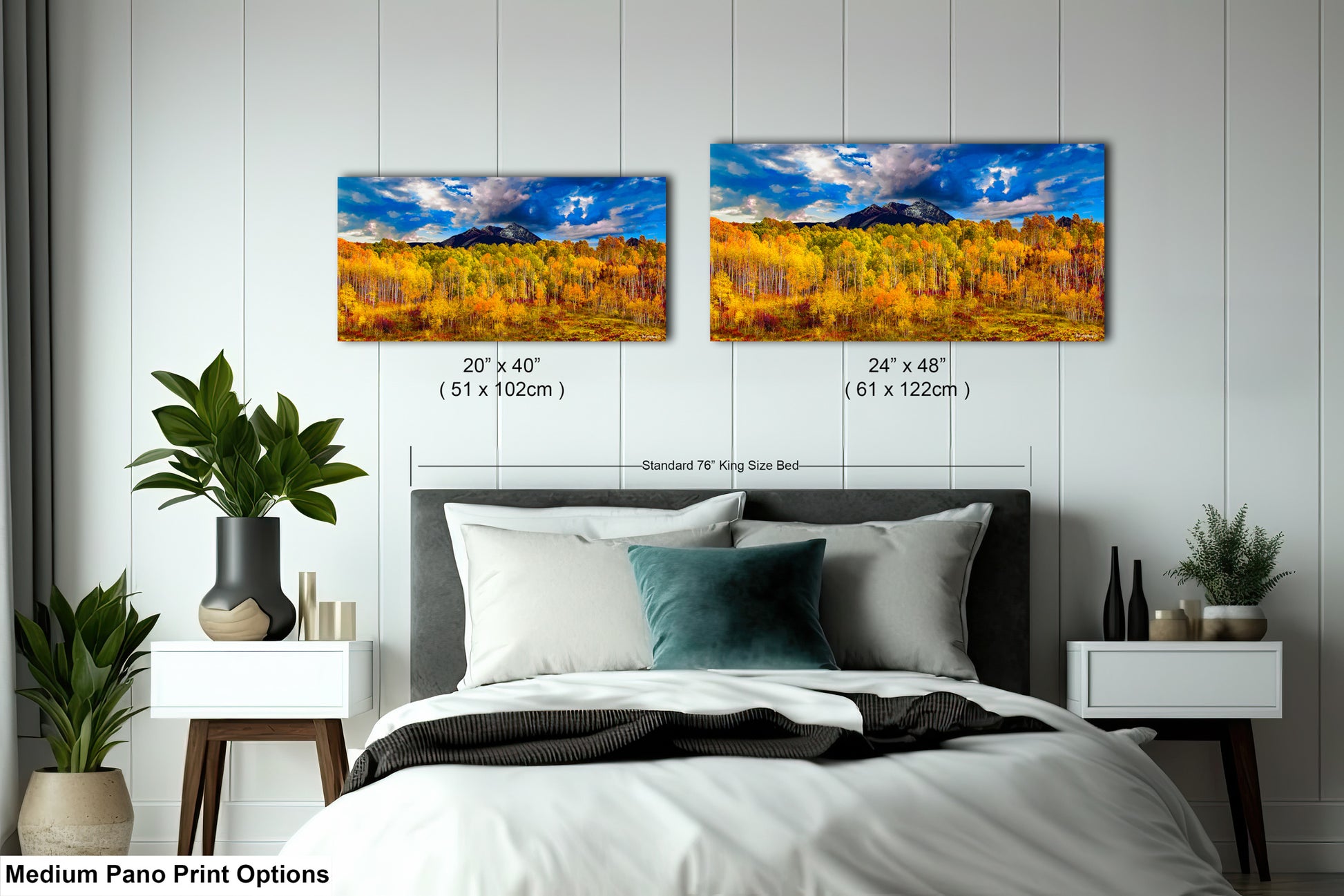 a bed room with a neatly made bed and two paintings on the wall