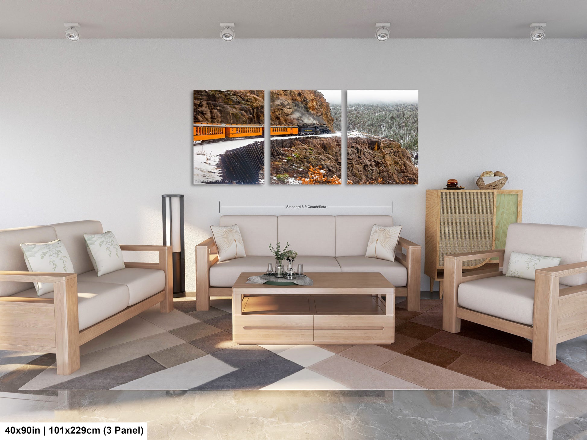 a living room filled with furniture and a painting on the wall