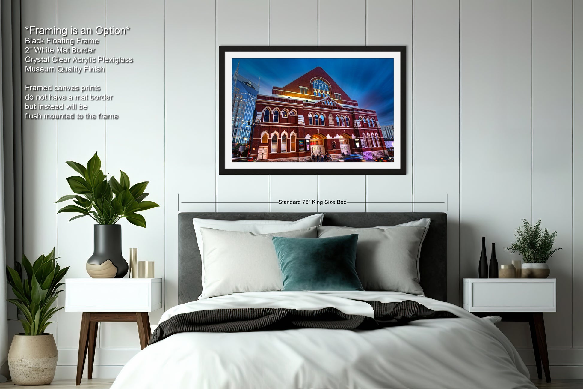 a bedroom with a bed and a picture hanging on the wall