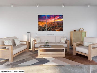 a living room filled with furniture and a painting on the wall