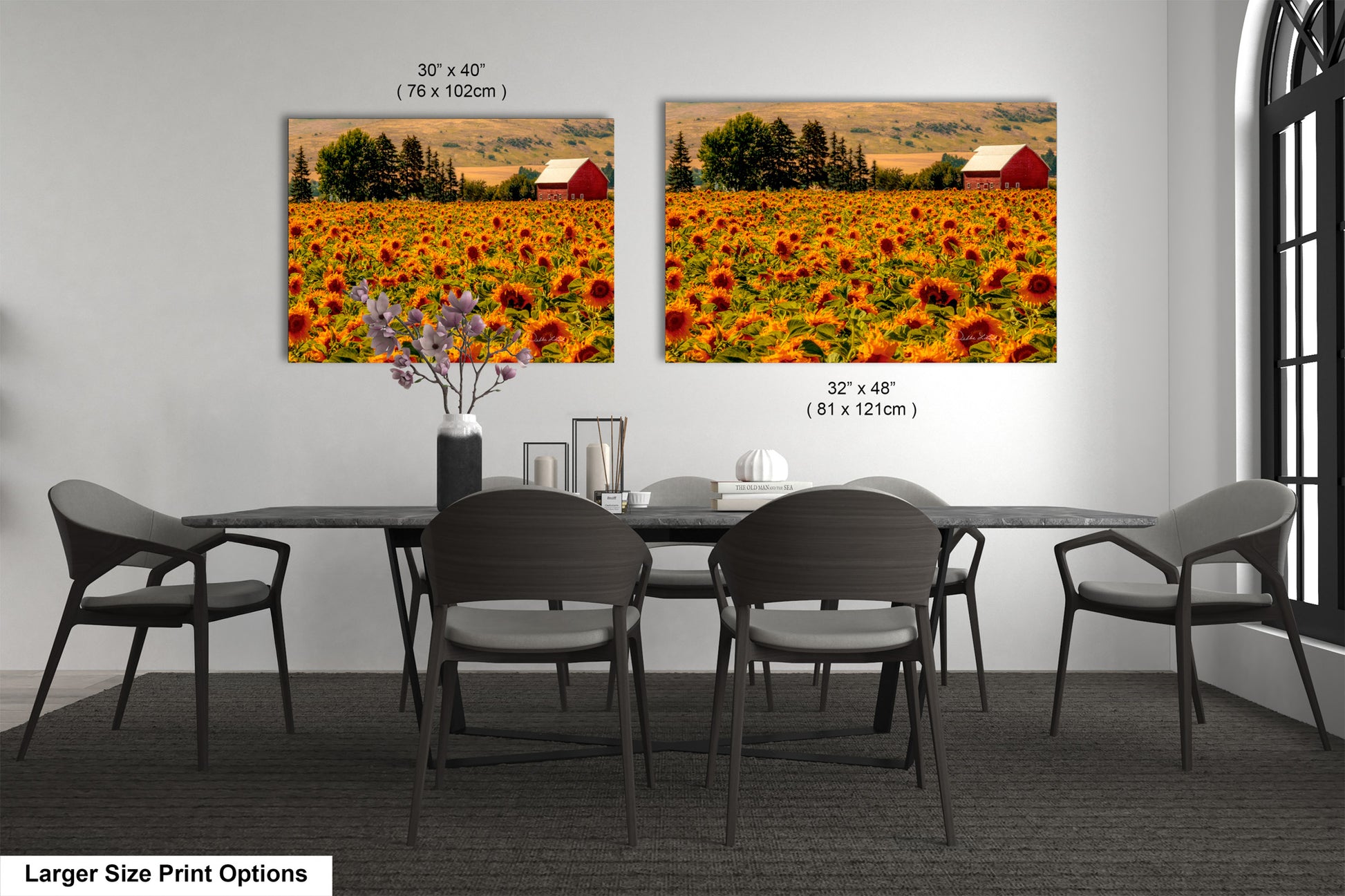 a dining room table with chairs and a vase of flowers