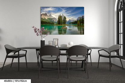 a dining room table with chairs and a painting on the wall
