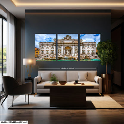a living room filled with furniture and a large window