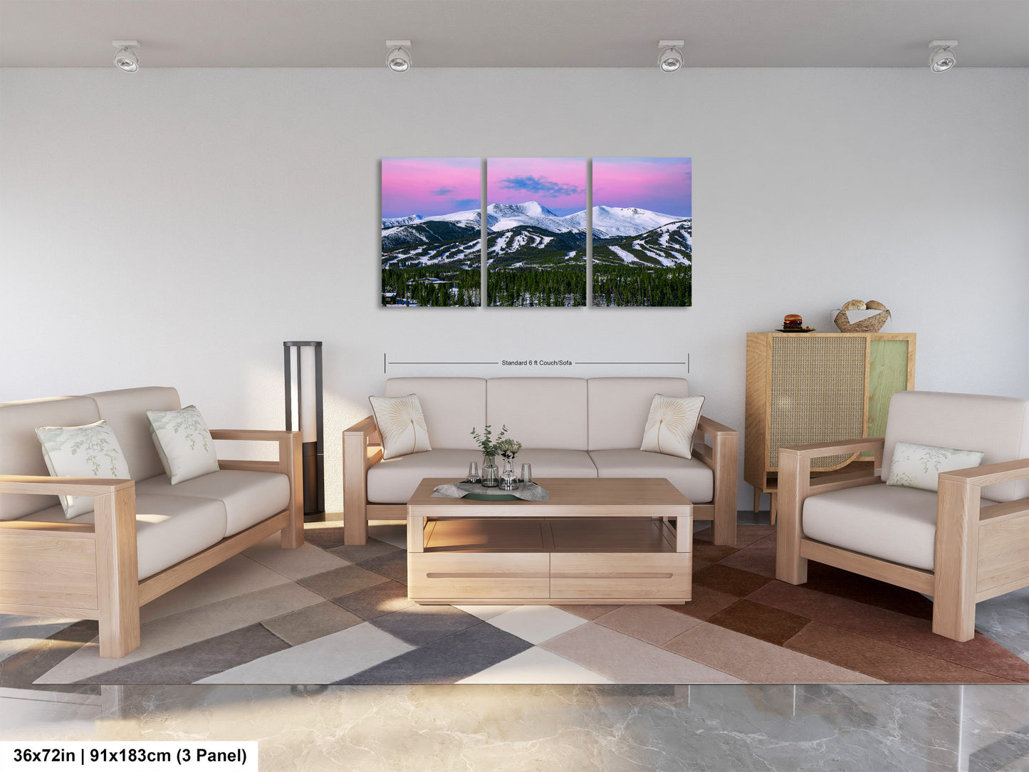 a living room filled with furniture and a painting on the wall