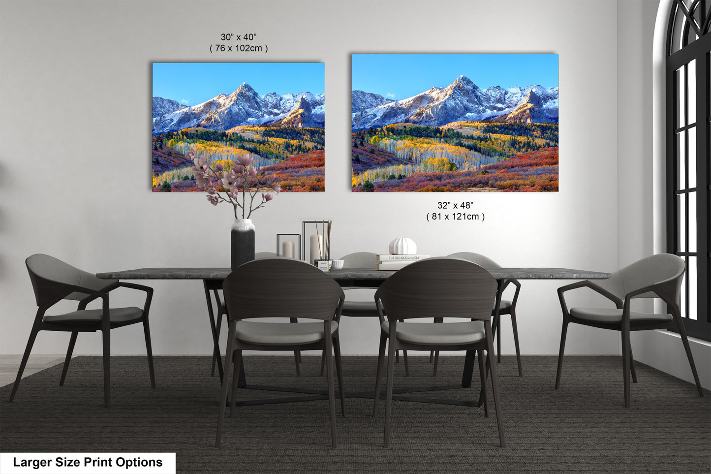 a dining room with a table and chairs
