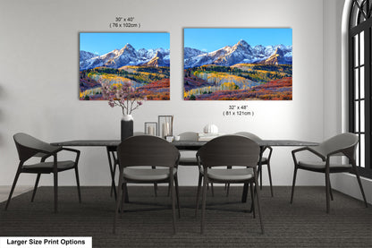 a dining room with a table and chairs