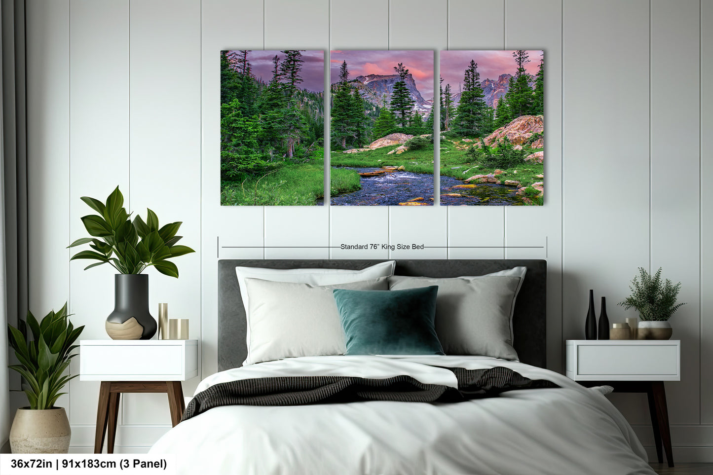 a bedroom with a bed and two paintings on the wall