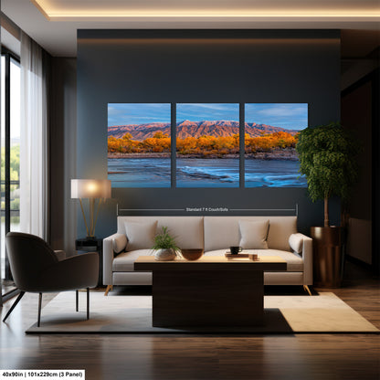 a living room filled with furniture and a painting on the wall