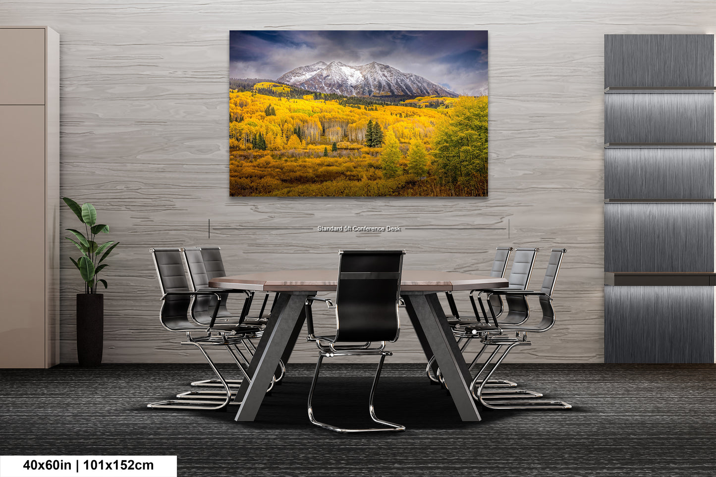 a dining room table with chairs and a painting on the wall