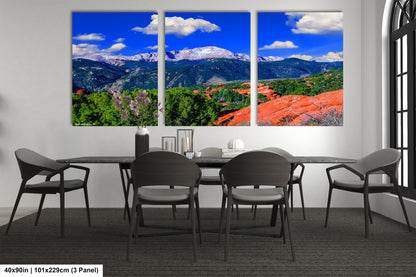 a dining room with a table and four chairs