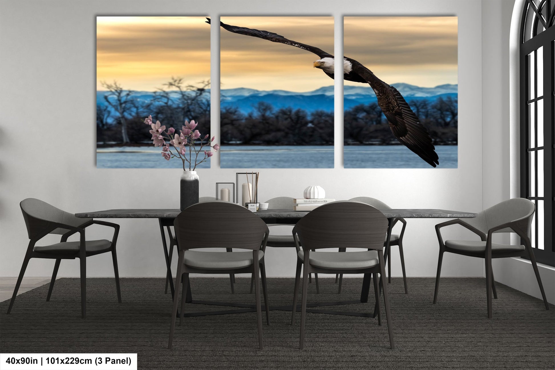 a bird flying over a table with chairs