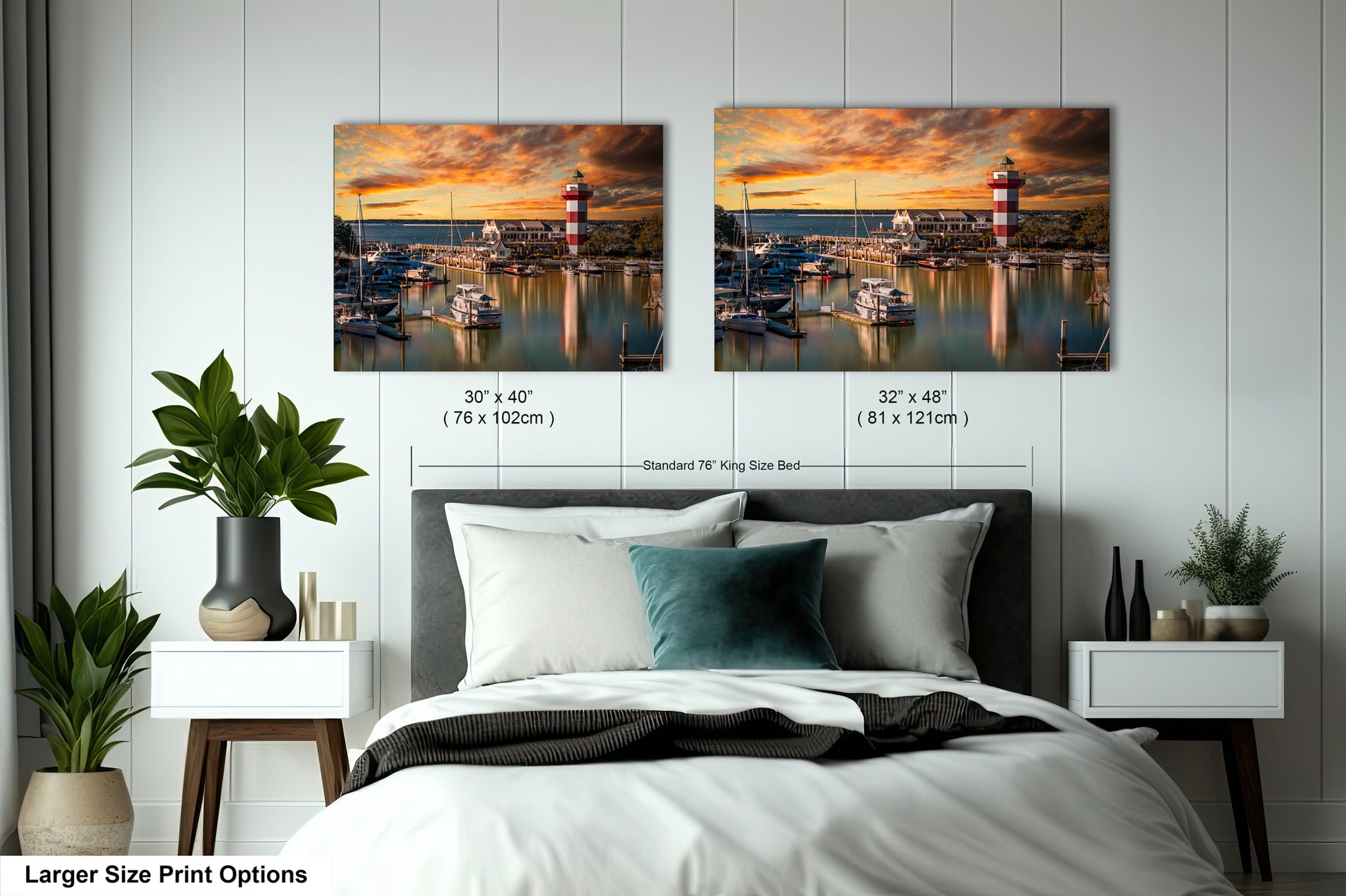 a bedroom with a bed and two pictures on the wall