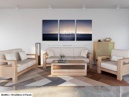 a living room filled with furniture and a painting on the wall