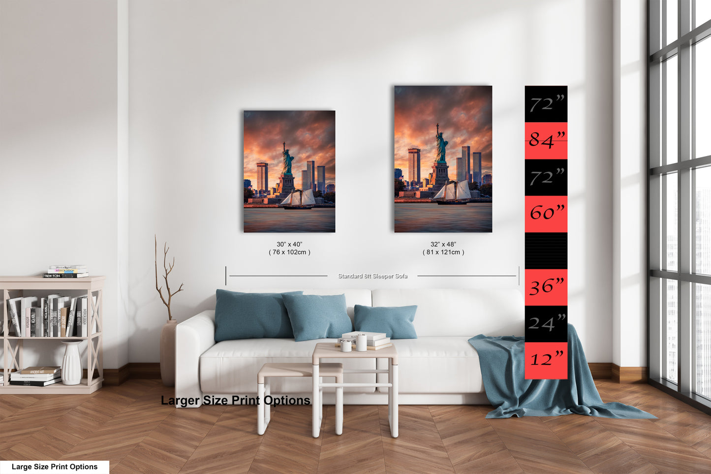 a living room with a white couch and two pictures on the wall