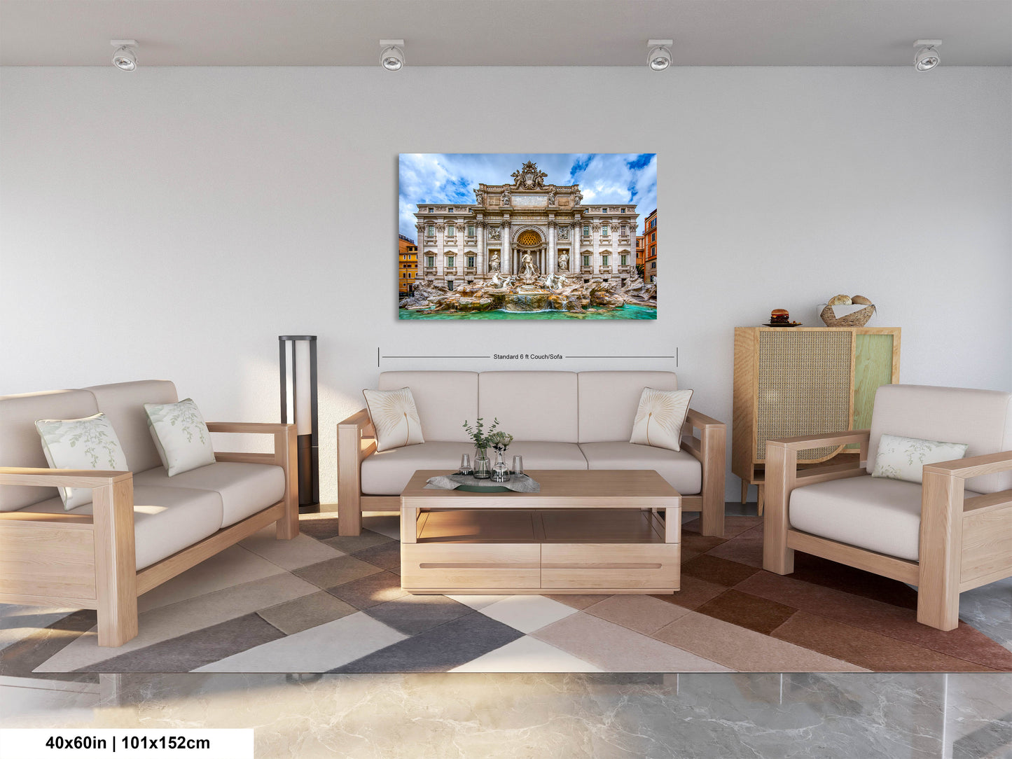 a living room filled with furniture and a painting on the wall