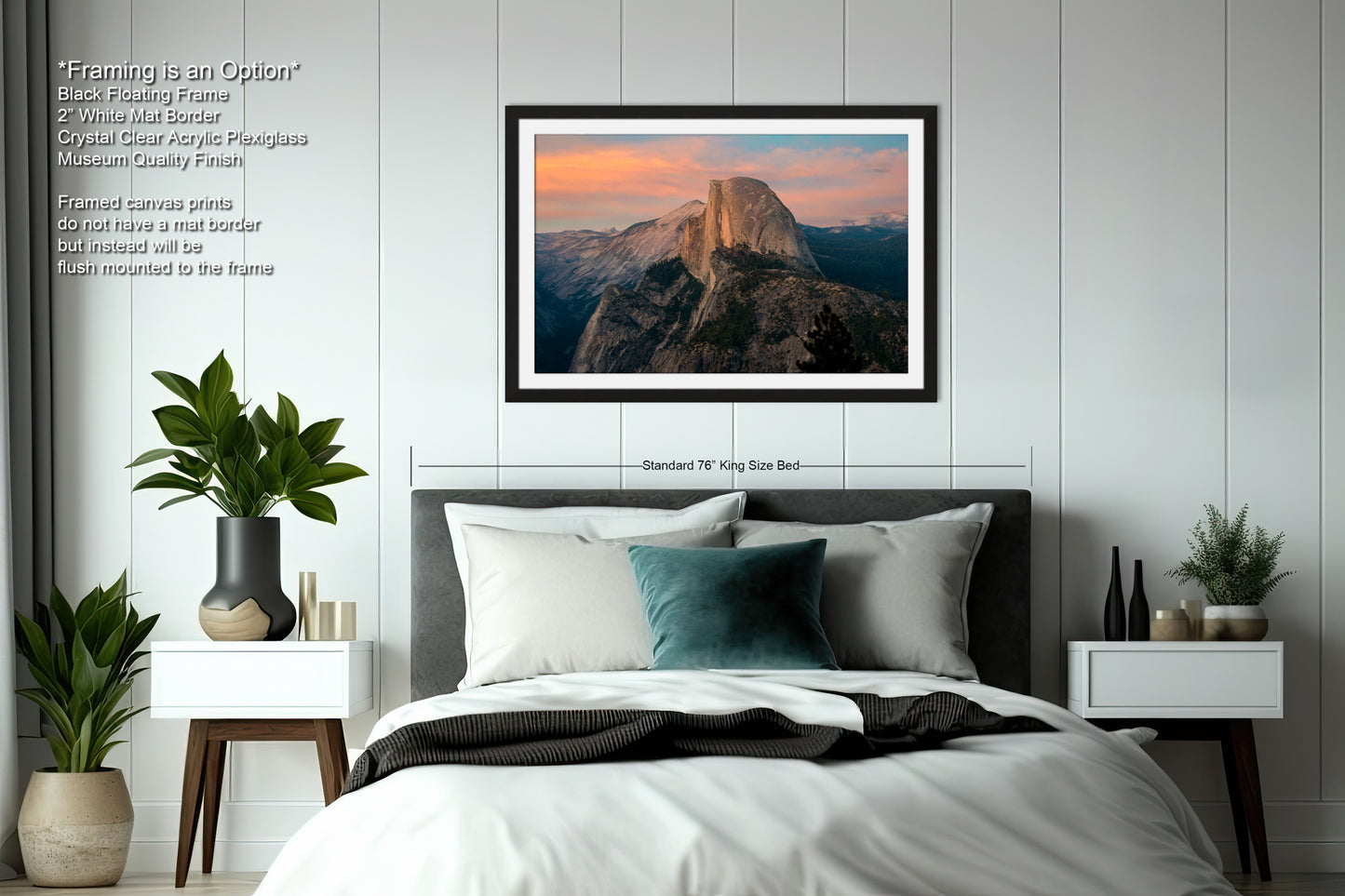 a bedroom with a bed and a picture hanging on the wall