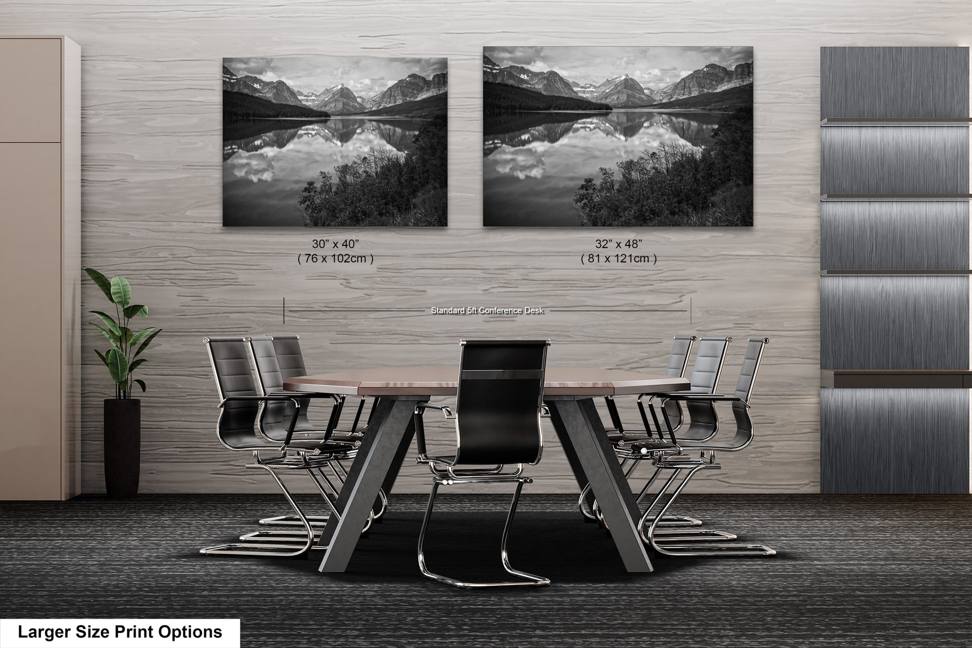 a black and white photo of a table and chairs
