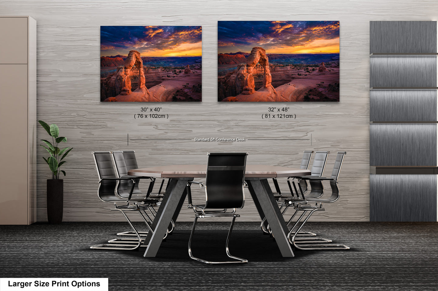 a dining room table with chairs and two pictures on the wall