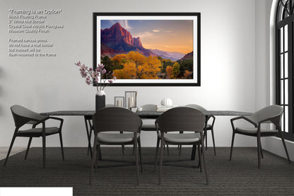 a dining room with a table and chairs