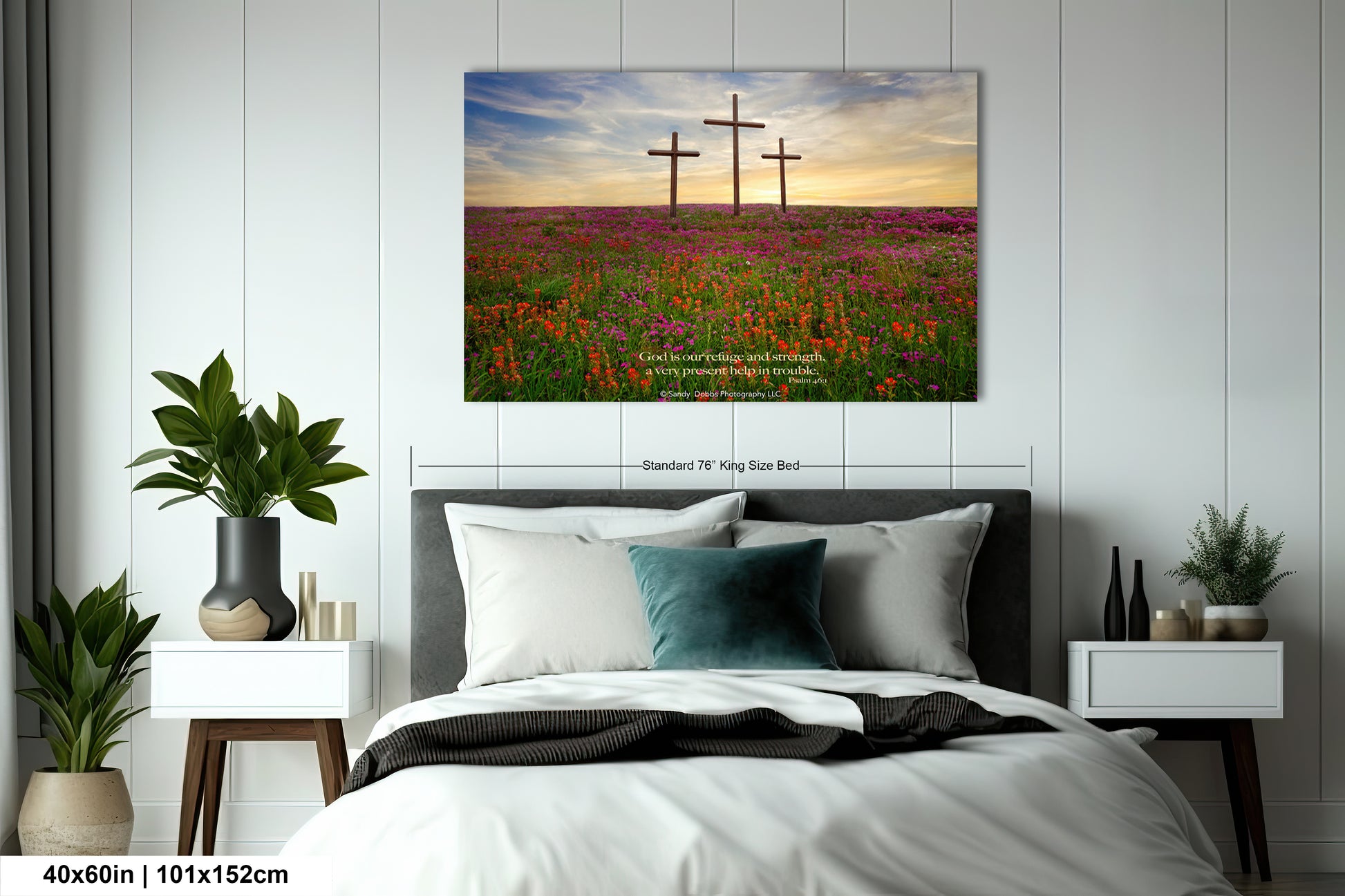 a bedroom with a large bed and a painting on the wall