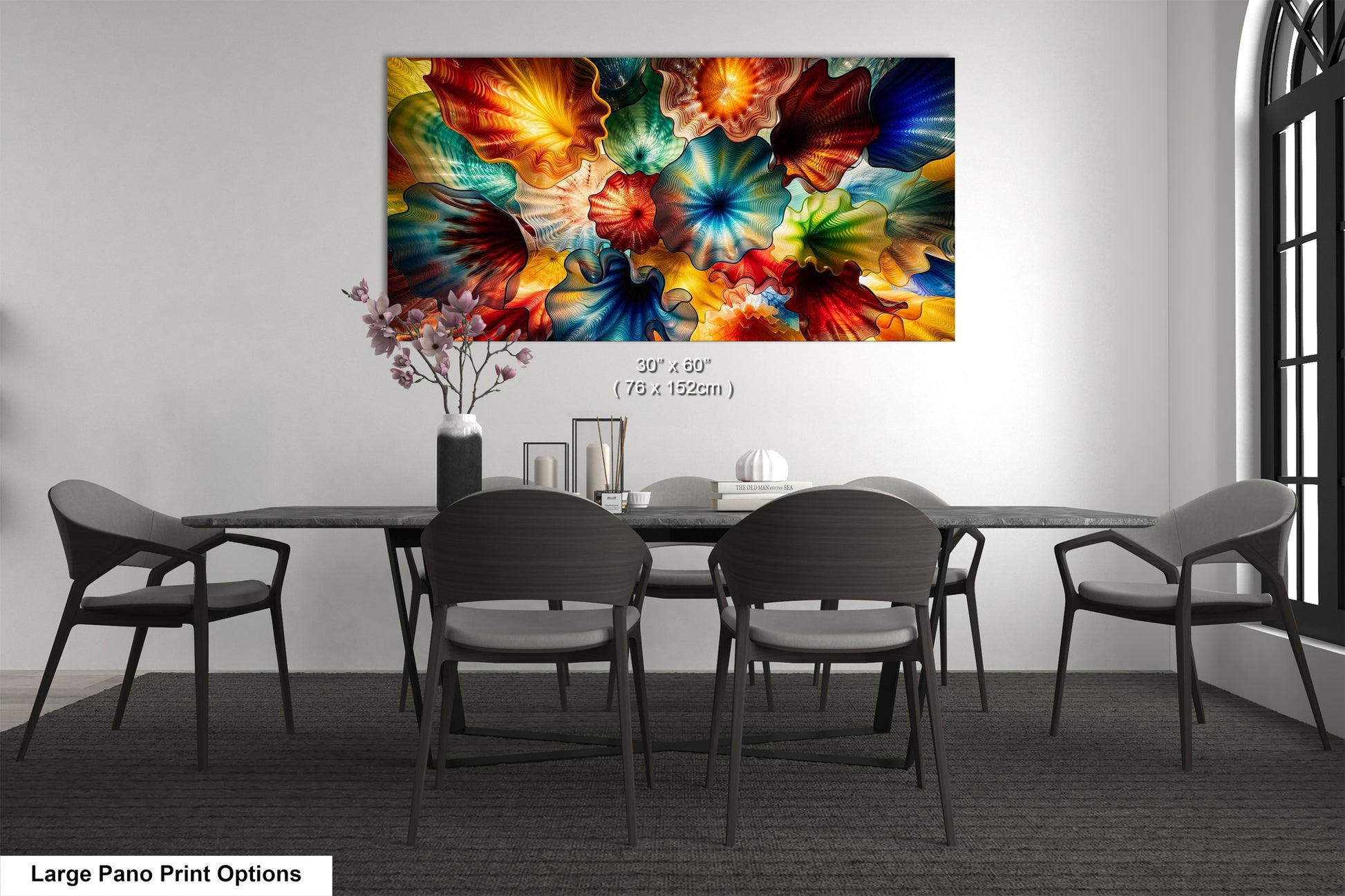 a large, colorful abstract painting hanging on a wall above a dining table with six chairs.