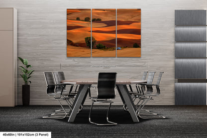 a dining room with a table and chairs