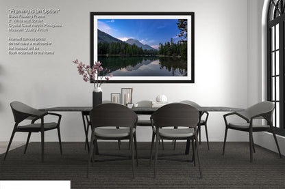 a picture of a dining room with a table and chairs