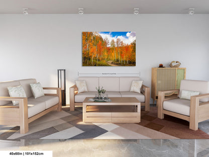 a living room filled with furniture and a painting on the wall