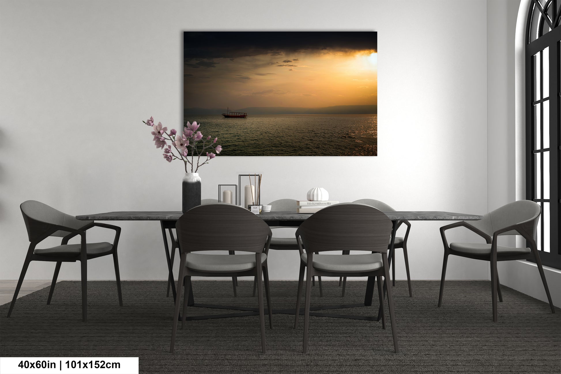 a dining room table with chairs and a vase of flowers