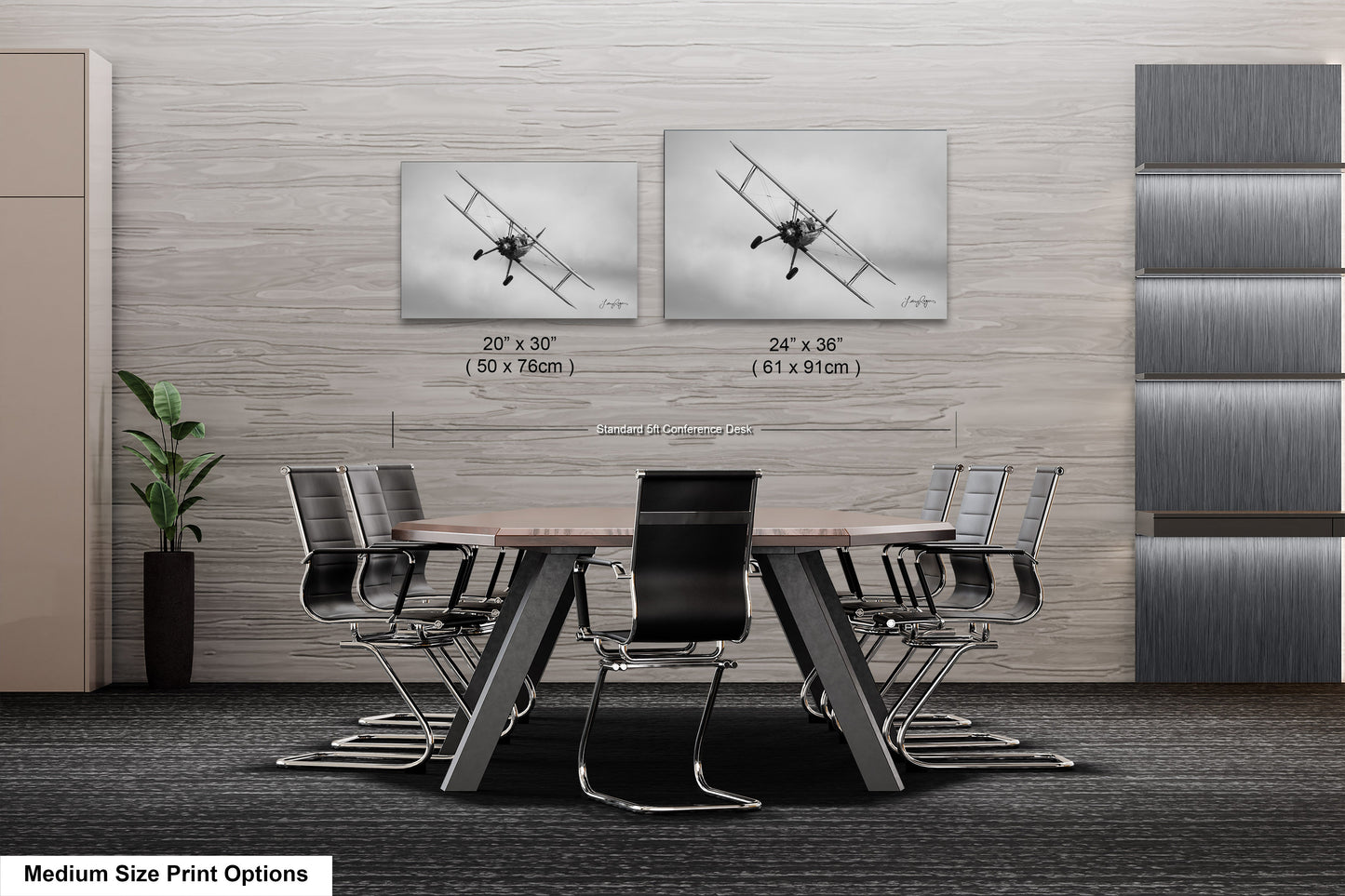 a dining room table with chairs and pictures on the wall