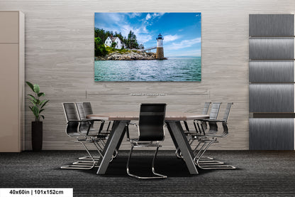 a dining room table with chairs and a picture of a lighthouse