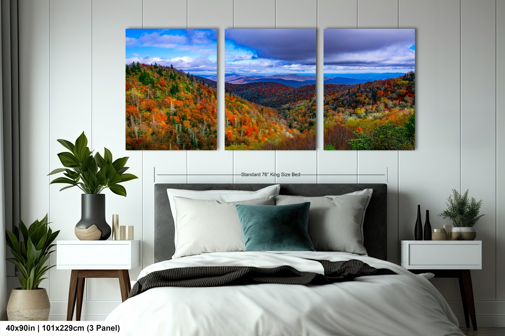 a bed room with a neatly made bed and two pictures on the wall