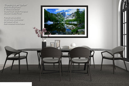a picture of a dining room with a table and chairs