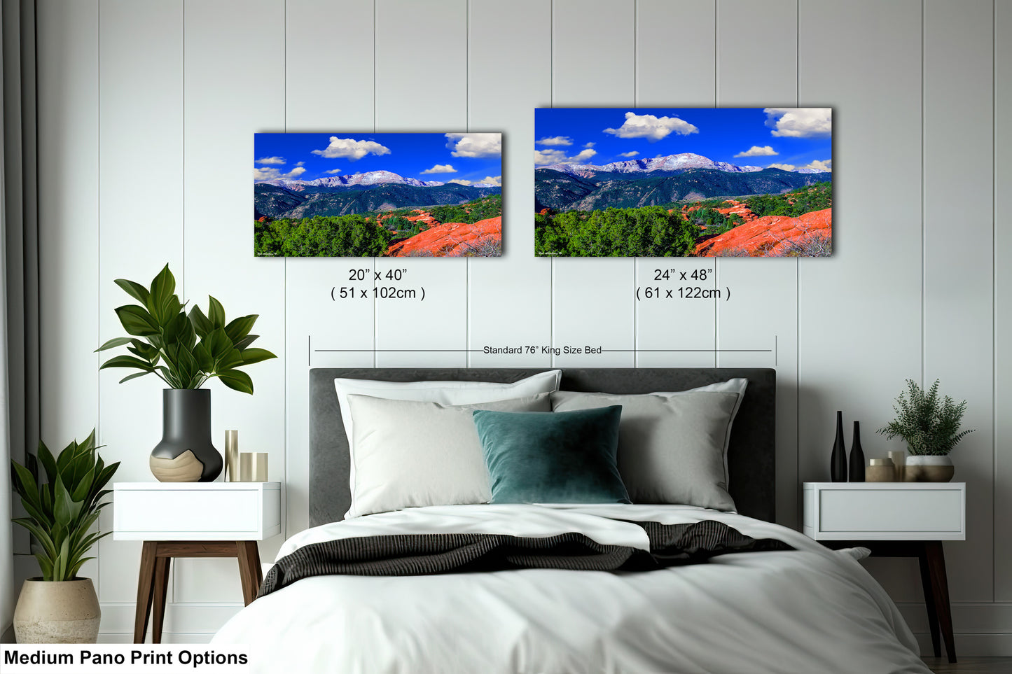 a bedroom with a bed and two pictures on the wall