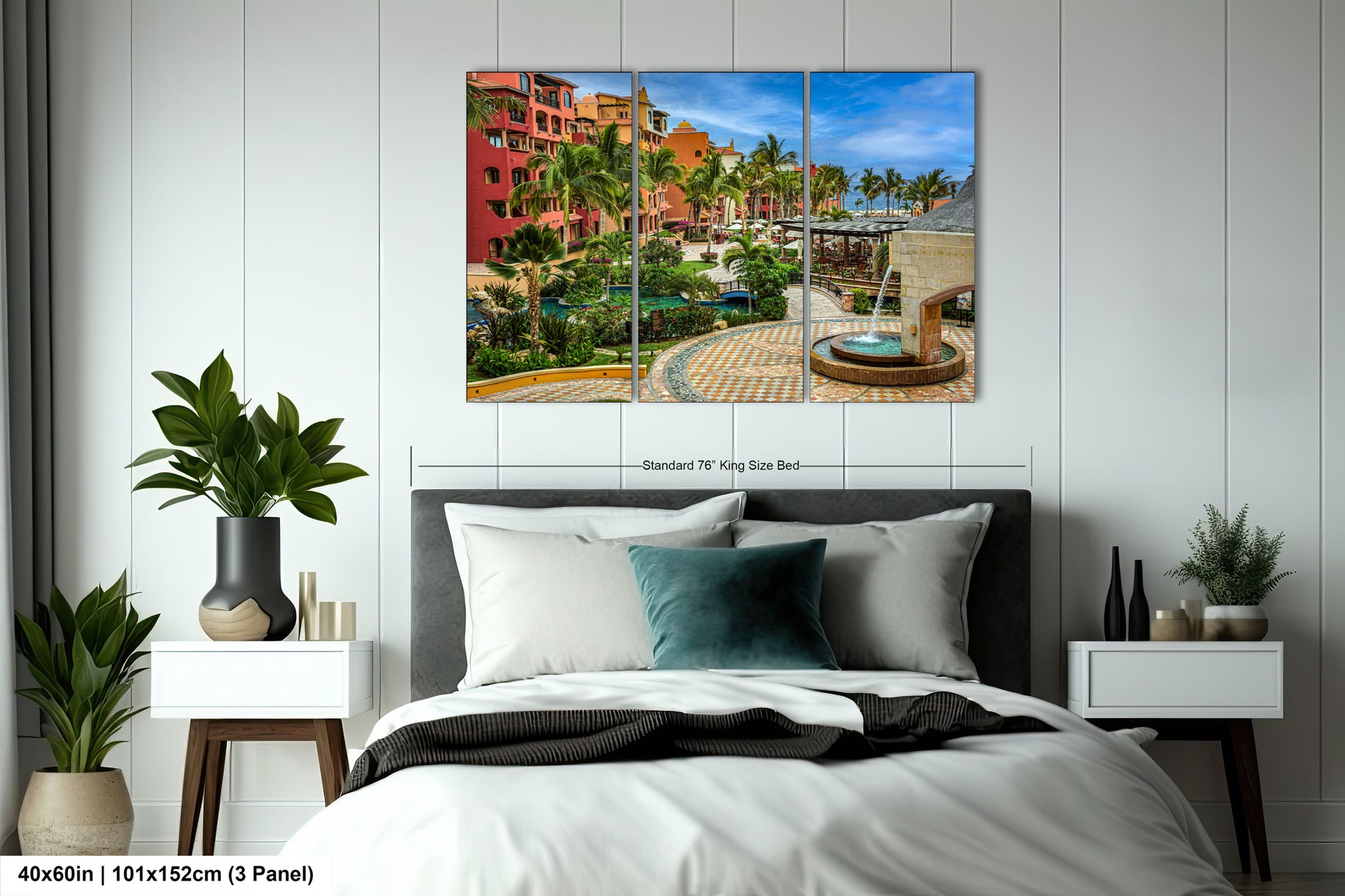 a bed room with a neatly made bed and a painting on the wall