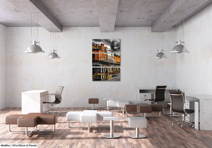 a room with a lot of chairs and a painting on the wall