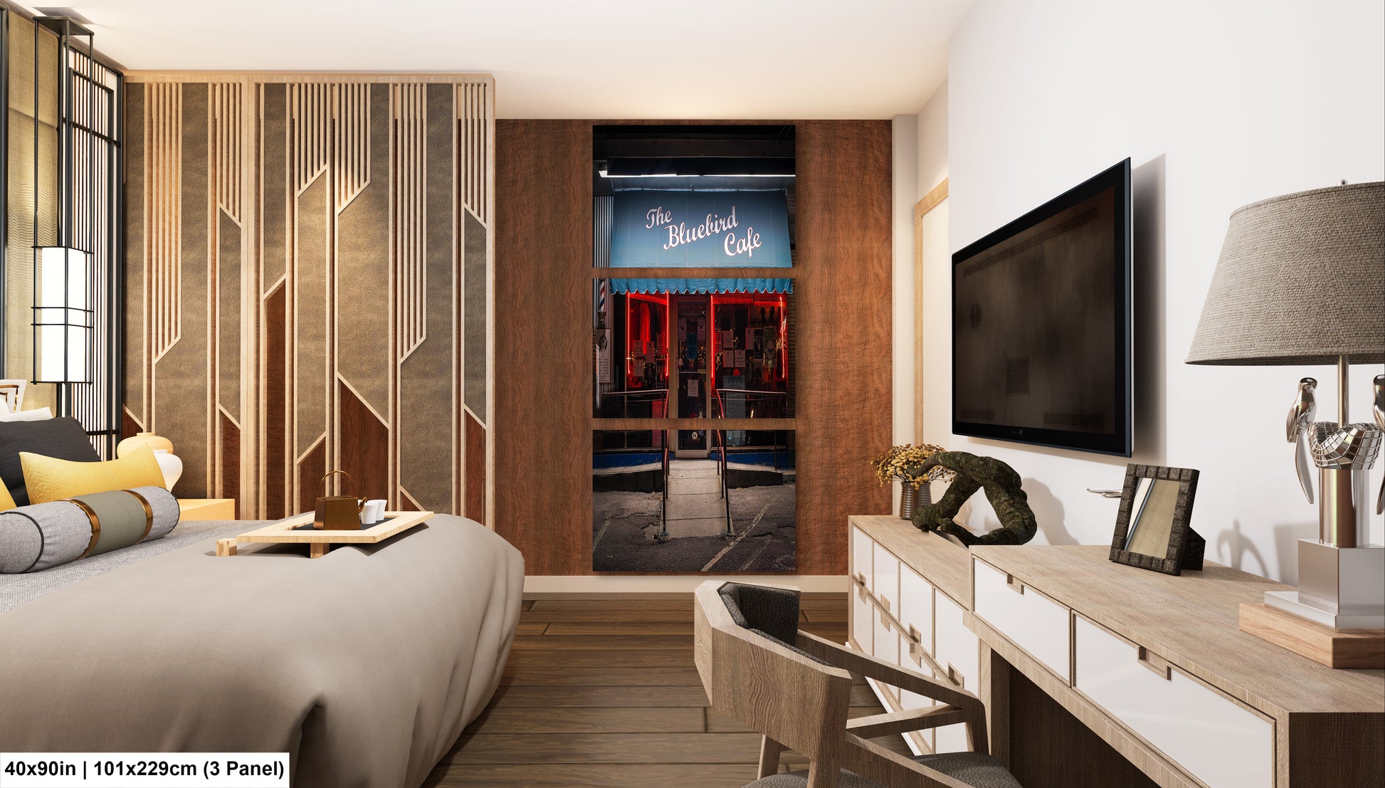 a hotel room with a bed, desk and television