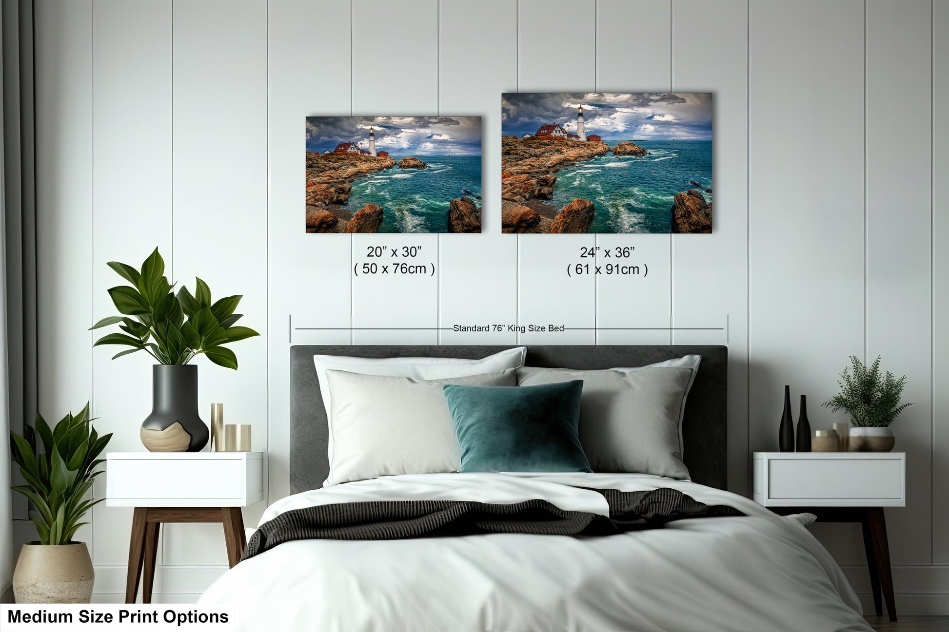 a bed with two pictures on the wall above it