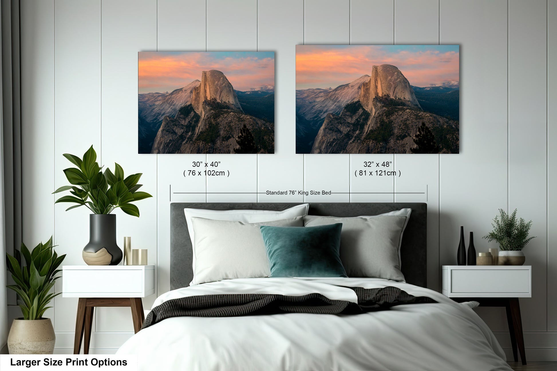 a bedroom with a bed and two pictures on the wall