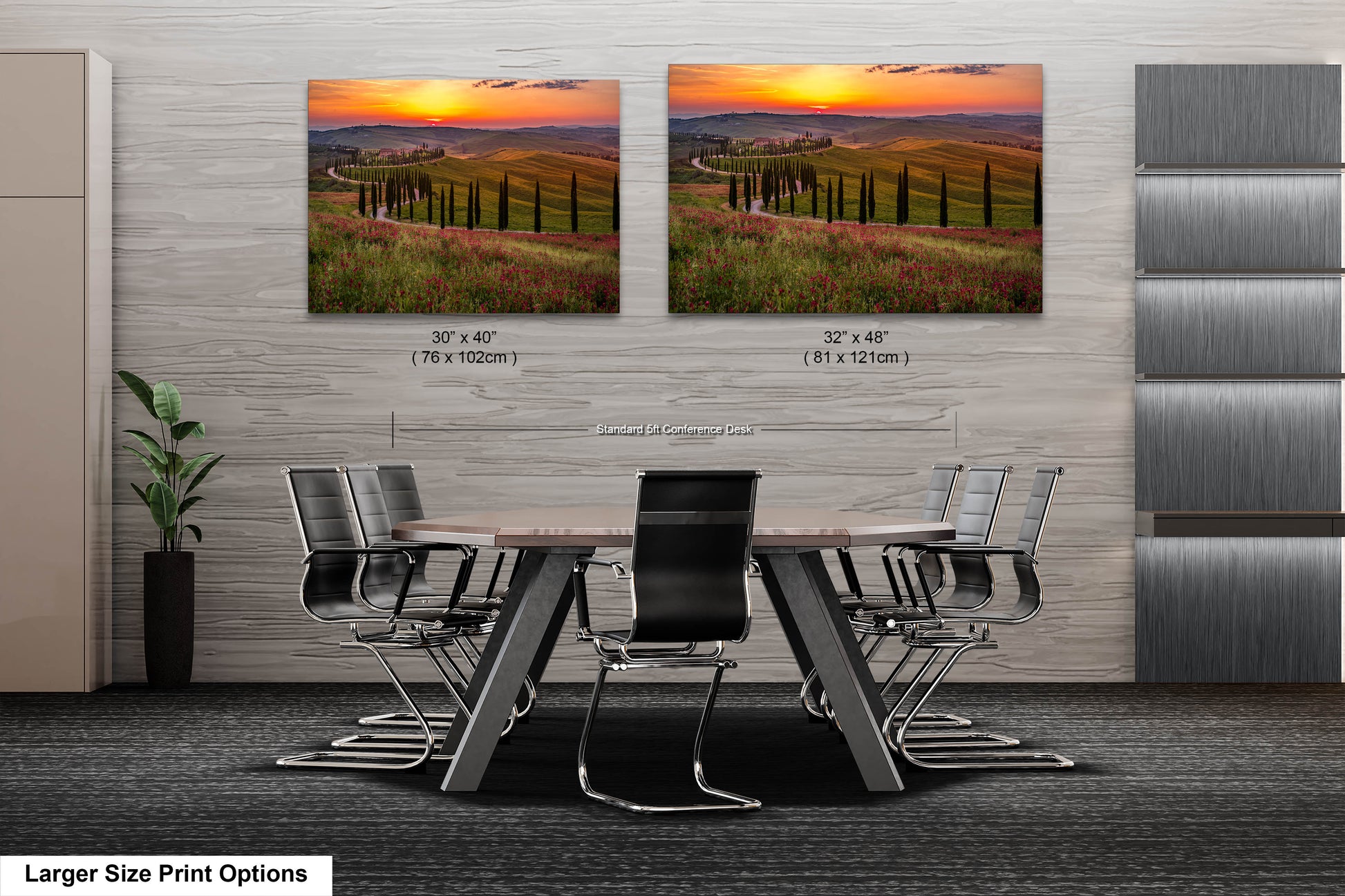 a dining room table with chairs and two pictures on the wall