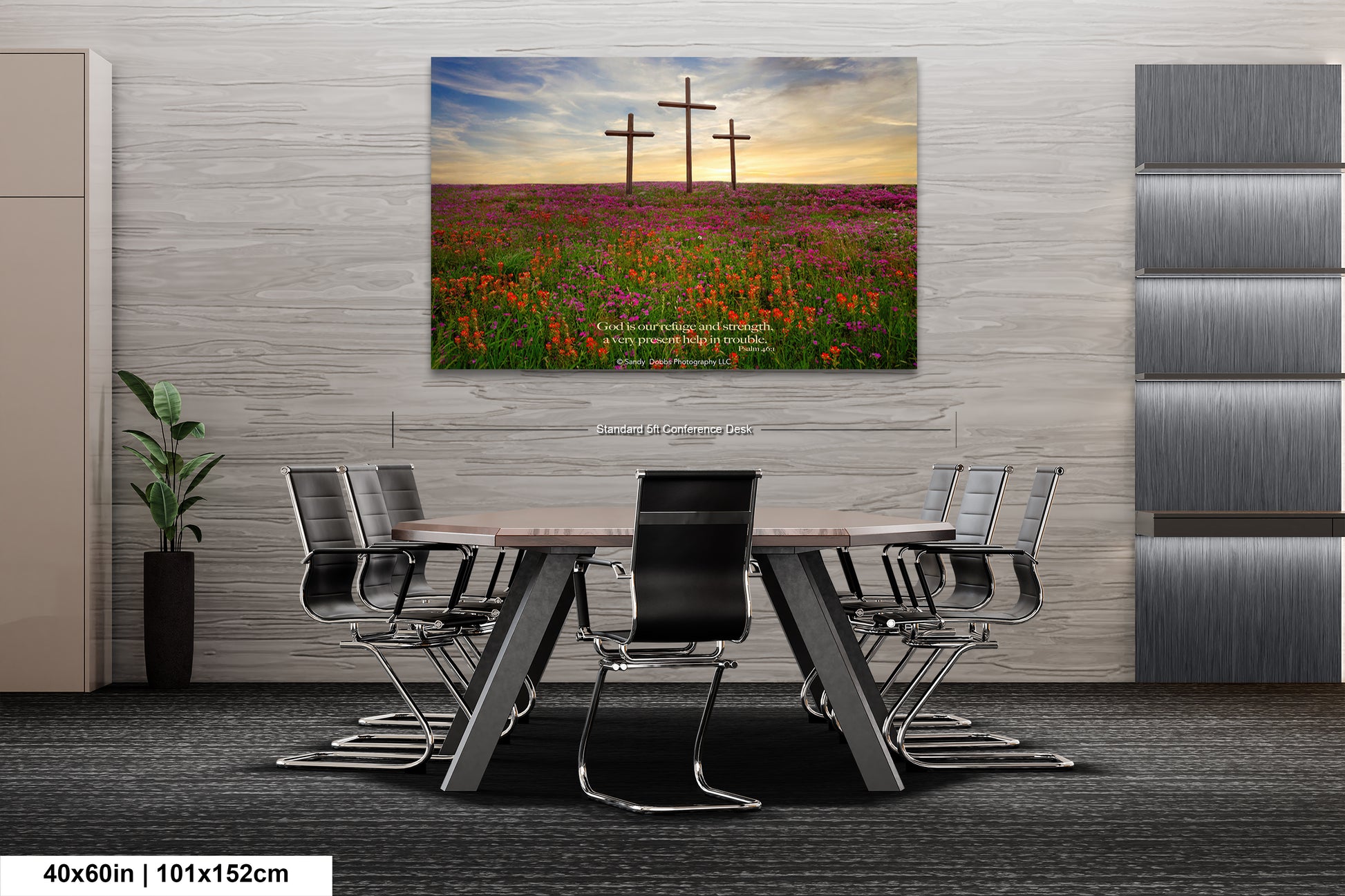 a room with a table and chairs and a painting on the wall