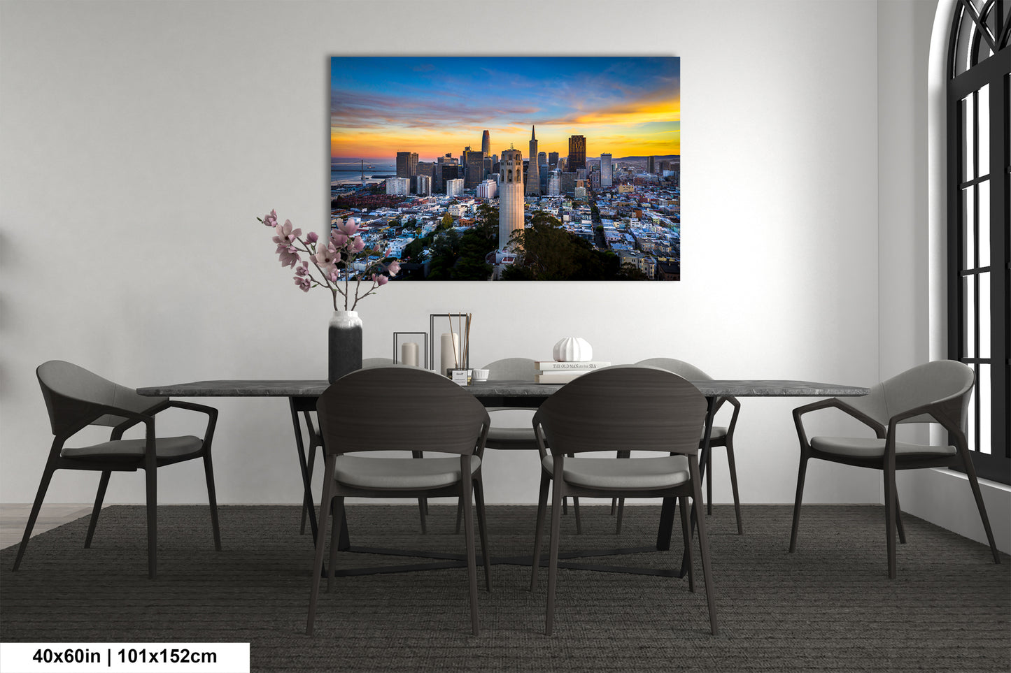 a dining room table with a view of a city