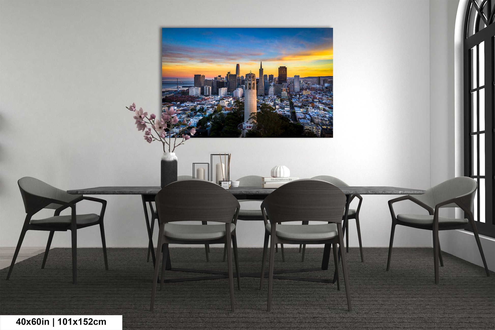 a dining room table with a view of a city