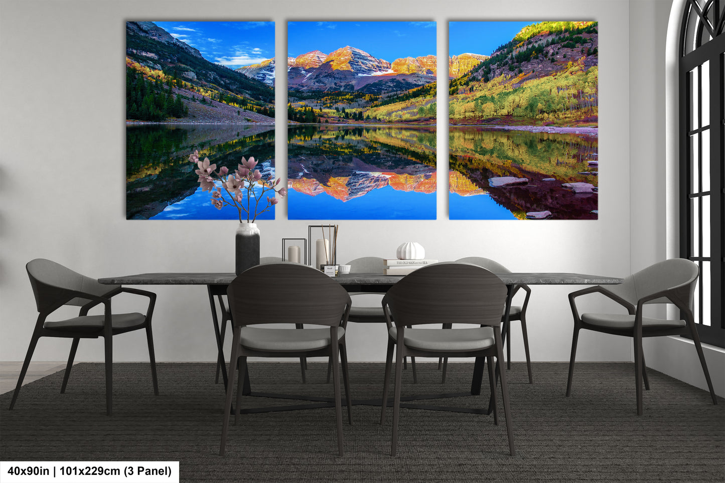 a dining room with a table and four chairs