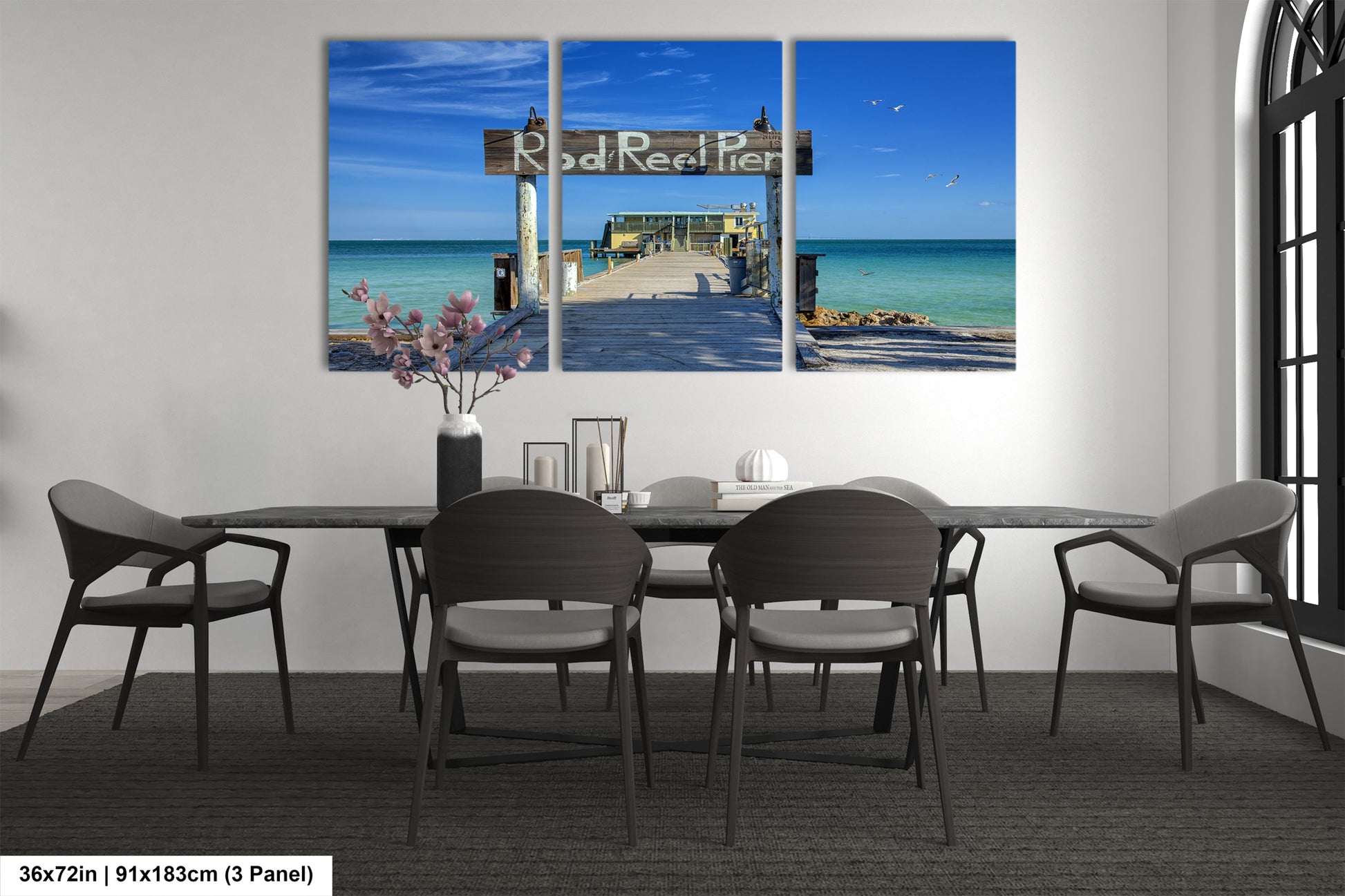 a dining room with a table and chairs