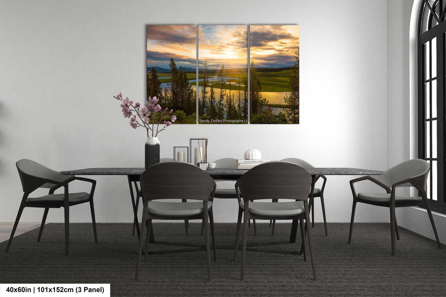 a dining room with a table and chairs