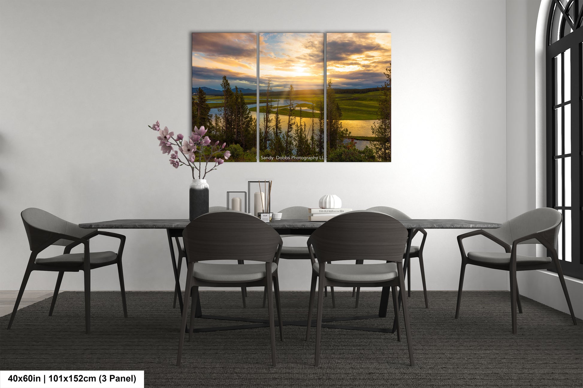 a dining room with a table and chairs