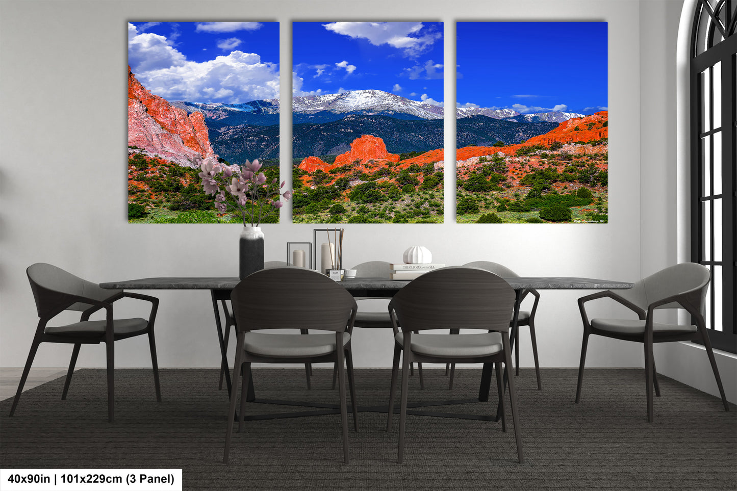 a dining room with a table and chairs