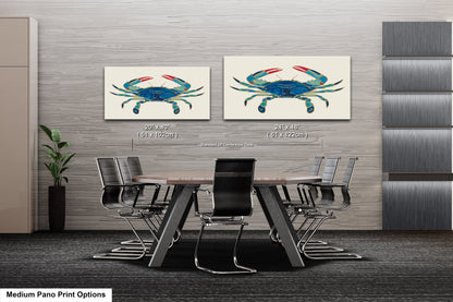 a dining room table with chairs and two paintings of crabs on the wall